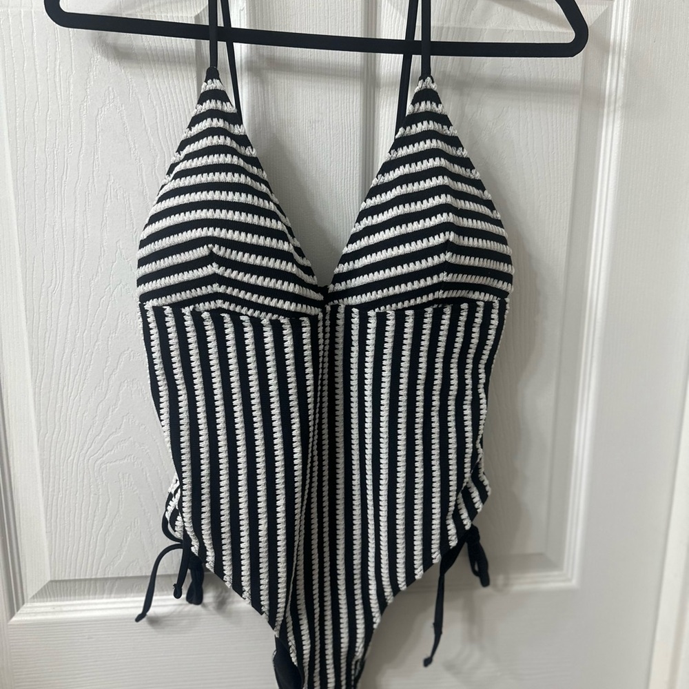 Fashion Nova Black + White Striped One Piece Swimsuit brand new never been worn.
